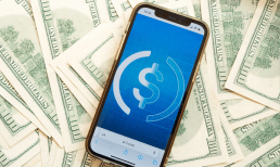 cash and phone with stablecoin symbol